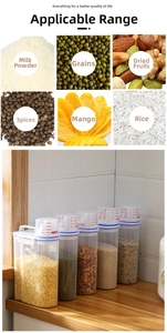 Detail of transparent kitchen storage jars with measuring lids for grains and dry foods
