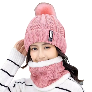 Pink winter knit beanie with pompom and fleece-lined neck warmer set for outdoor warmth