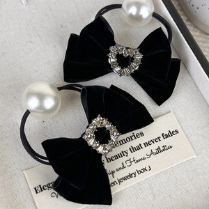 Elegant set of black velvet bow hair ties with rhinestones and glossy faux pearls