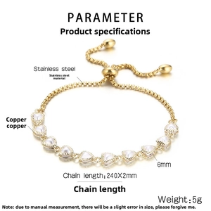 Detailed view of adjustable heart link bracelet featuring white shell inlay and gold finish