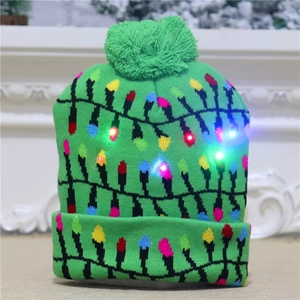 Green knit Christmas hat with glowing LED lights and dinosaur colorful bulb patterns