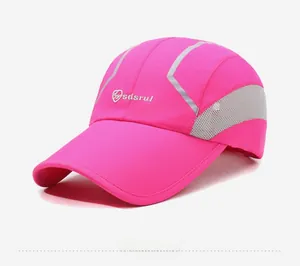 Detail of rose pink quick-dry sports cap showing grey breathable side mesh and branding