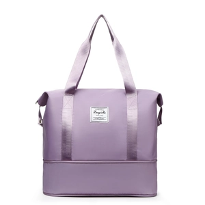 Expandable purple Oxford fabric travel bag with high-capacity storage and waterproof finish