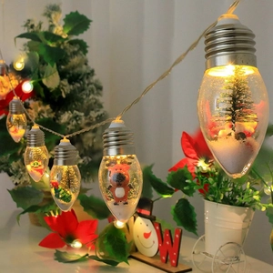 Festive Christmas LED string lights with reindeer and pine trees inside clear bulbs