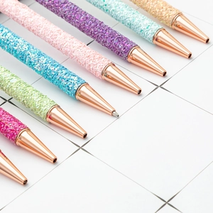 Chic glitter ballpoint pens in multiple colors with elegant rose gold metal accents