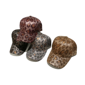 Metallic leopard print baseball caps for women in gold silver and red brown tones