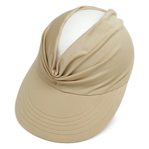 Detailed view of khaki empty-top sun hat with elegant gathered pleats on crown.