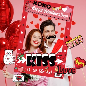Valentine's Day photo booth prop set with heart frame and romantic accessories