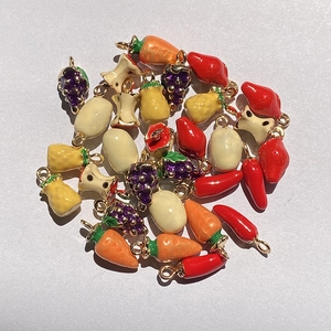 Mix of colorful fruit and vegetable enamel pendants with golden rings for DIY jewelry
