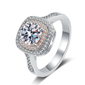 Elegant halo ring with 1ct round moissanite and rose gold accents in 925 silver