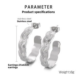 Detail view of silver twisted hoop earrings made of durable stainless steel 25x6mm
