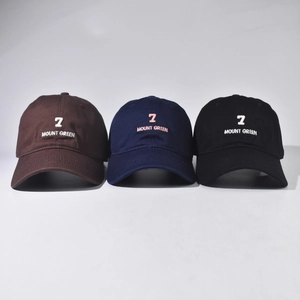 Cotton baseball caps with 7 Mount Green embroidery in brown, navy, and black colors