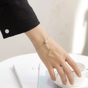 Elegant gold-plated heart pendant bracelet with micro-paved cubic zirconia for women