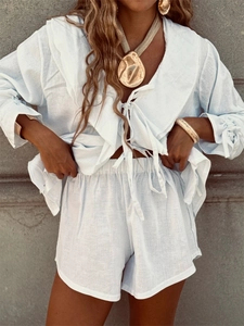 Light blue cotton set with ruffle V-neck tie-front shirt and matching drawstring shorts