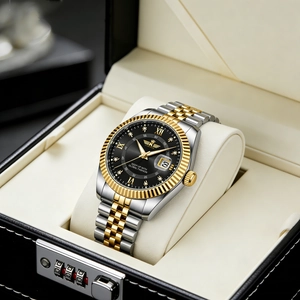 Detail of a luxury men's steel watch with black dial in an automatic leather watch winder box