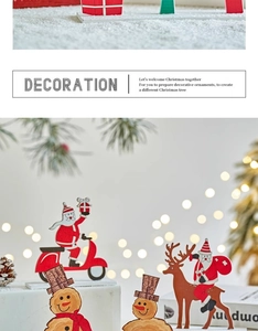 Detailed view of handmade wooden Santa and snowman figurines for Christmas table decor