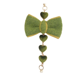 Green plush bow DIY accessory with gold trim and heart pendant for jewelry making