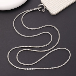 Close-up of luxury rhinestone crossbody phone strap with silver chain and spring buckle