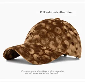 Detailed texture of coffee corduroy baseball cap with stylish polka dot pattern and soft finish