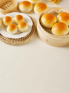 Macro shot of realistic PU foam bun toy with yellow texture on a bamboo steamer