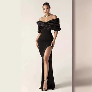 Elegant black off-shoulder evening dress with satin ruching and high leg slit detail