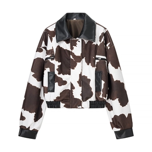 Women's cropped jacket with cow print and black faux leather collar in a street style design