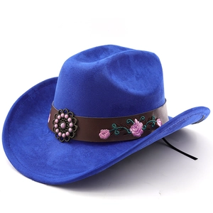 Detail of blue suede cowboy hat with brown leather band and rose floral embroidery