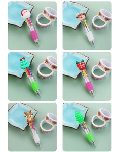 Detail of Christmas retractable multi-color pens with Santa and reindeer cartoon toppers