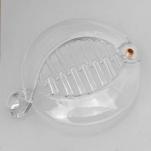 Detail view of transparent plastic banana hair clip with curved multi-tooth design