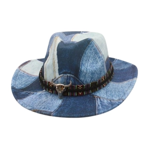 Vintage western cowboy hat with denim patchwork, ethnic band and metal bull head detail