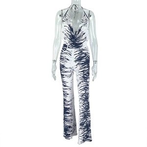 Detailed view of women's zebra print halter top and high-waist flared pants set