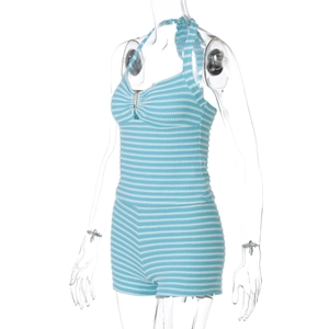 Detailed texture of blue and white striped knit fabric on a halter top and shorts set