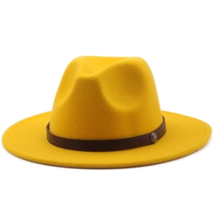Close-up of vibrant yellow fedora hat with dark brown leather band and metal buckle