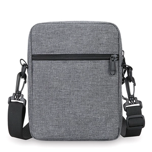 Minimalist grey crossbody bag for men with adjustable shoulder strap and front zipper pocket