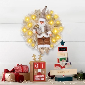 Weihnachtskranz mit Weihnachtsmann und LED Lichtern für festliche Innendekoration