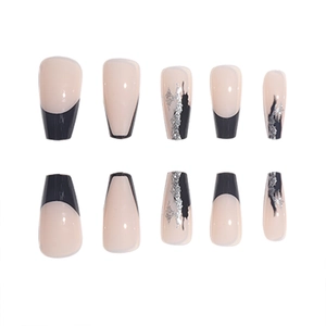 French ballerina false nails in nude with black tips and silver glitter accents