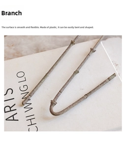 Close-up of flexible brown artificial jasmine branch with realistic bark texture