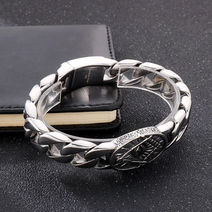 Close-up of silver 316L stainless steel chain bracelet with Freemasonry eye symbol clasp