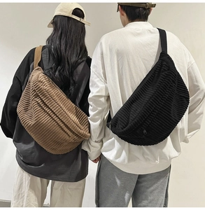 Dual view of brown and black corduroy crossbody bags worn by models for size reference