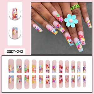 Long square graffiti press-on nails with colorful cartoon floral patterns and 24pc set