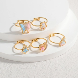 Golden children ring set with colorful resin butterfly, bear, heart, and rabbit designs