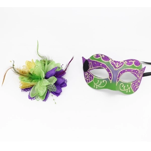Detail of purple, green and gold masquerade mask with feathers and flower headpiece