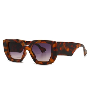 Modern tortoiseshell square sunglasses for women with purple gradient lenses in 45-degree view