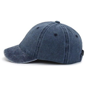 Navy blue washed cotton baseball cap with a soft crown and short brim in a vintage style