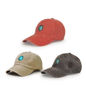 Vintage washed cotton baseball caps with earth embroidery in red, sand, and charcoal colors