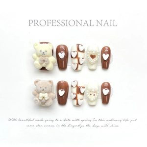 Handmade brown and cream press-on nails with 3D flocking bears and pearl heart accents