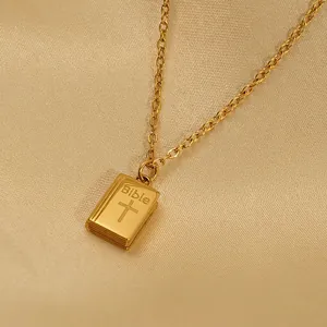 Gold stainless steel Bible book pendant necklace with cross detail and thin link chain
