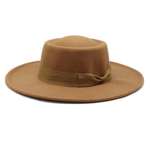 Classic brown wool felt flat top boater hat with a wide brim and ribbon band decoration
