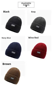 Close-up of winter knit beanies in black, gray, navy, burgundy, and brown colors