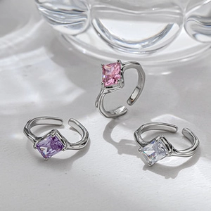 Detailed shot of three S925 silver adjustable rings with rectangular colored gemstones